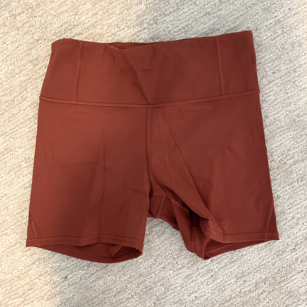 Athleta Lightning Bike Shorts (5 inch) in rust
